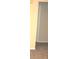 Short hallway with neutral walls and carpet at 5701 Soldier Cir # 104, Sarasota, FL 34233