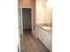 Clean bathroom with white vanity and tile flooring at 5701 Soldier Cir # 104, Sarasota, FL 34233