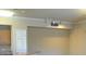 Living room with track lighting and neutral walls at 5701 Soldier Cir # 104, Sarasota, FL 34233