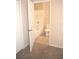 Bathroom with tub, toilet and door to bedroom at 5701 Soldier Cir # 104, Sarasota, FL 34233
