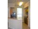 Efficient kitchen with black appliances and light wood cabinets at 5701 Soldier Cir # 104, Sarasota, FL 34233