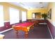 Community game room featuring a pool table and seating area at 5701 Soldier Cir # 104, Sarasota, FL 34233