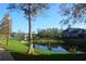 Picturesque lake view of community homes at 5701 Soldier Cir # 104, Sarasota, FL 34233