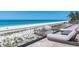 Relaxing balcony featuring ocean views and contemporary lounge seating at 5861 Gulf Of Mexico Dr, Longboat Key, FL 34228