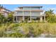 Modern three-story beachfront home with stunning ocean views at 5861 Gulf Of Mexico Dr, Longboat Key, FL 34228