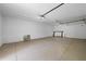 Empty garage interior showing an open layout and ample space for storage or parking at 5861 Gulf Of Mexico Dr, Longboat Key, FL 34228