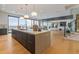 Spacious kitchen island with ocean view, pendant lights, and an open floor plan at 5861 Gulf Of Mexico Dr, Longboat Key, FL 34228