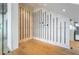 Contemporary wine room featuring a minimalist design and custom bottle storage at 5861 Gulf Of Mexico Dr, Longboat Key, FL 34228