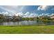 Scenic lakefront property with lush landscaping and beautiful homes at 7506 Eaton Ct, University Park, FL 34201