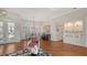 Bright dining room with hardwood floors and a charming chandelier at 7506 Eaton Ct, University Park, FL 34201