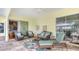 Relaxing patio with wicker furniture and a view of the pool at 7506 Eaton Ct, University Park, FL 34201