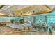 Casual dining area with herringbone floors and buffet at 7506 Eaton Ct, University Park, FL 34201