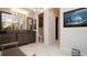 Bathroom with double vanity, separate toilet area and walk-in shower at 9260 Swaying Branch Rd, Sarasota, FL 34241