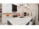 Gourmet kitchen with large island and high-end appliances at 9260 Swaying Branch Rd, Sarasota, FL 34241