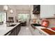 Spacious kitchen with breakfast nook and pool view at 9260 Swaying Branch Rd, Sarasota, FL 34241