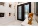 Elegant entryway with double doors and decorative niches at 9260 Swaying Branch Rd, Sarasota, FL 34241