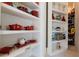 Well-organized pantry with custom shelving, offering ample storage space at 9260 Swaying Branch Rd, Sarasota, FL 34241