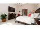 Main bedroom with king-size bed and ample closet space at 9260 Swaying Branch Rd, Sarasota, FL 34241