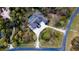 Luxury home situated on a spacious lot with a circular driveway at 9260 Swaying Branch Rd, Sarasota, FL 34241