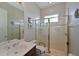 Bathroom featuring a glass enclosed shower and ample vanity space at 10209 Discovery Ter, Bradenton, FL 34212