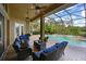 Outdoor patio with seating area and pool view at 10209 Discovery Ter, Bradenton, FL 34212