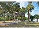 Scenic gazebo overlooking waterfront property with lush landscaping at 10209 Discovery Ter, Bradenton, FL 34212