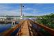 Wooden walkway leads to boat slips at a tranquil marina at 10209 Discovery Ter, Bradenton, FL 34212