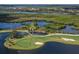 Golf course island green and water at 10209 Discovery Ter, Bradenton, FL 34212