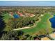 Aerial view of golf course community with lush green landscape at 10209 Discovery Ter, Bradenton, FL 34212