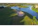 Golf course with sand traps near water at 10209 Discovery Ter, Bradenton, FL 34212