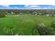 Large grassy soccer field with goals, surrounded by trees and community park at 12224 Longview Lake Cir, Bradenton, FL 34211