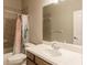 Clean bathroom with a single sink vanity and shower/tub combo at 14106 18Th E Pl, Bradenton, FL 34212