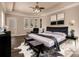 Luxurious bedroom with a king-size bed and stylish decor at 14106 18Th E Pl, Bradenton, FL 34212