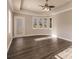 Bright bedroom featuring hardwood floors and access to outdoor space at 14106 18Th E Pl, Bradenton, FL 34212