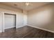 Spacious bedroom featuring ample closet space and wood-look floors at 14106 18Th E Pl, Bradenton, FL 34212