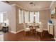 Elegant dining room, wood table and hardwood floors at 14106 18Th E Pl, Bradenton, FL 34212