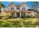 Two-story house with a large front yard and double-door entry at 14106 18Th E Pl, Bradenton, FL 34212