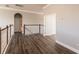 Upstairs hallway with hardwood floors and access to bedrooms at 14106 18Th E Pl, Bradenton, FL 34212