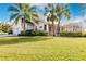House exterior showcasing a backyard view and landscaping at 14106 18Th E Pl, Bradenton, FL 34212