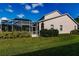 House exterior showcasing a side view and landscaping at 14106 18Th E Pl, Bradenton, FL 34212