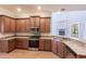 Modern kitchen with granite countertops and stainless steel appliances at 14106 18Th E Pl, Bradenton, FL 34212