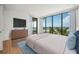 Main bedroom with ocean view and large window at 1561 Gulf Of Mexico Dr # 403, Longboat Key, FL 34228