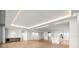 Bright and airy living room with modern kitchen and elevator access at 1561 Gulf Of Mexico Dr # 403, Longboat Key, FL 34228