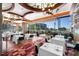 Elegant restaurant with white tablecloths, modern chairs, and ocean views at 1561 Gulf Of Mexico Dr # 403, Longboat Key, FL 34228