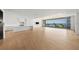 Spacious living area with modern kitchen and ocean views at 1561 Gulf Of Mexico Dr # 403, Longboat Key, FL 34228