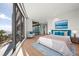 Main bedroom with stunning ocean views and sitting area at 1561 Gulf Of Mexico Dr # 403, Longboat Key, FL 34228