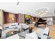 Relaxing lounge with comfortable seating and fireplace at 1561 Gulf Of Mexico Dr # 403, Longboat Key, FL 34228