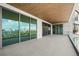 Private balcony with sliding glass doors and city views at 1561 Gulf Of Mexico Dr # 403, Longboat Key, FL 34228
