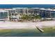 Aerial view of resort and pristine beach with ocean views at 1561 Gulf Of Mexico Dr # 403, Longboat Key, FL 34228