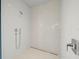 Walk-in shower with mosaic tile and linear drain at 1561 Gulf Of Mexico Dr # 403, Longboat Key, FL 34228